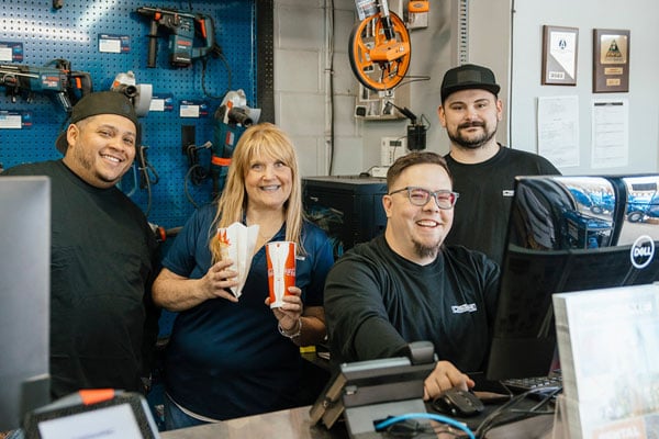 relationships Team at Concrete Accessories Inc. showcasing jobsite tools and equipment, including power tools and construction supplies.