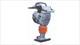Gas-powered rammer for effective soil compaction at construction sites, essential for optimal rebar reinforcement and concrete slab preparation.